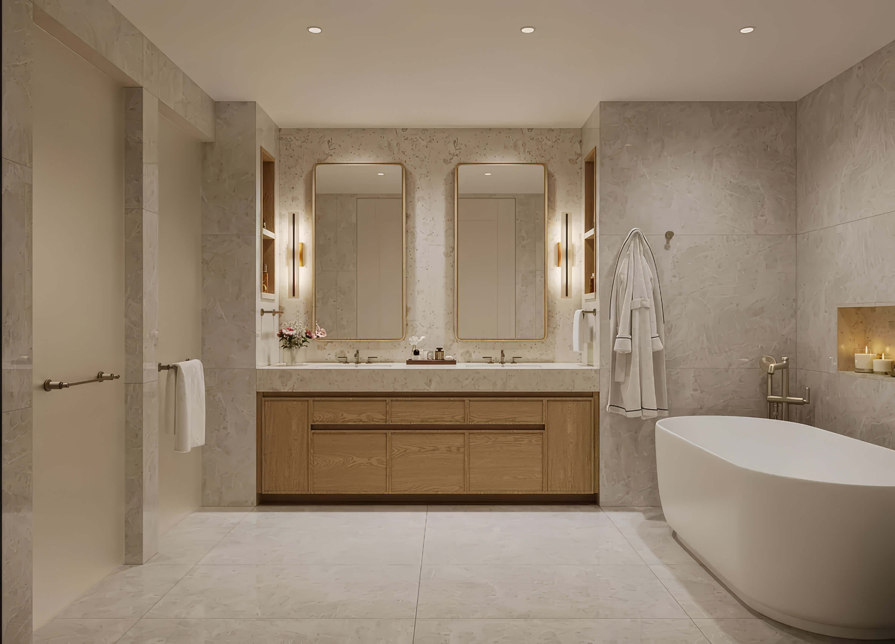 Bathroom with a paneled double vanity, twin mirrors and a freestanding tub at St Regis Residences Bahia Mar