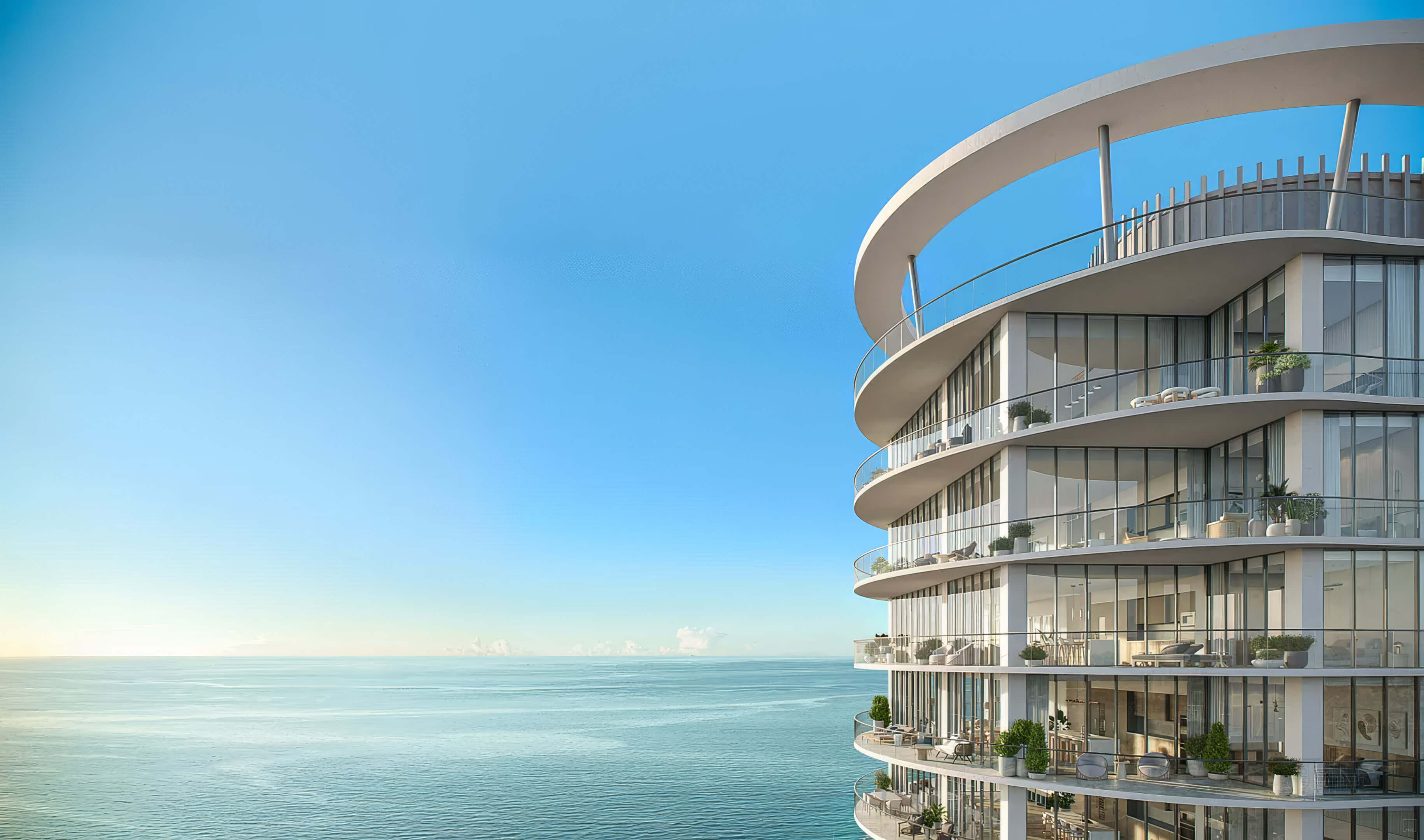Close view of curved balconies and glass railings facing the ocean at St Regis Residences Bahia Mar