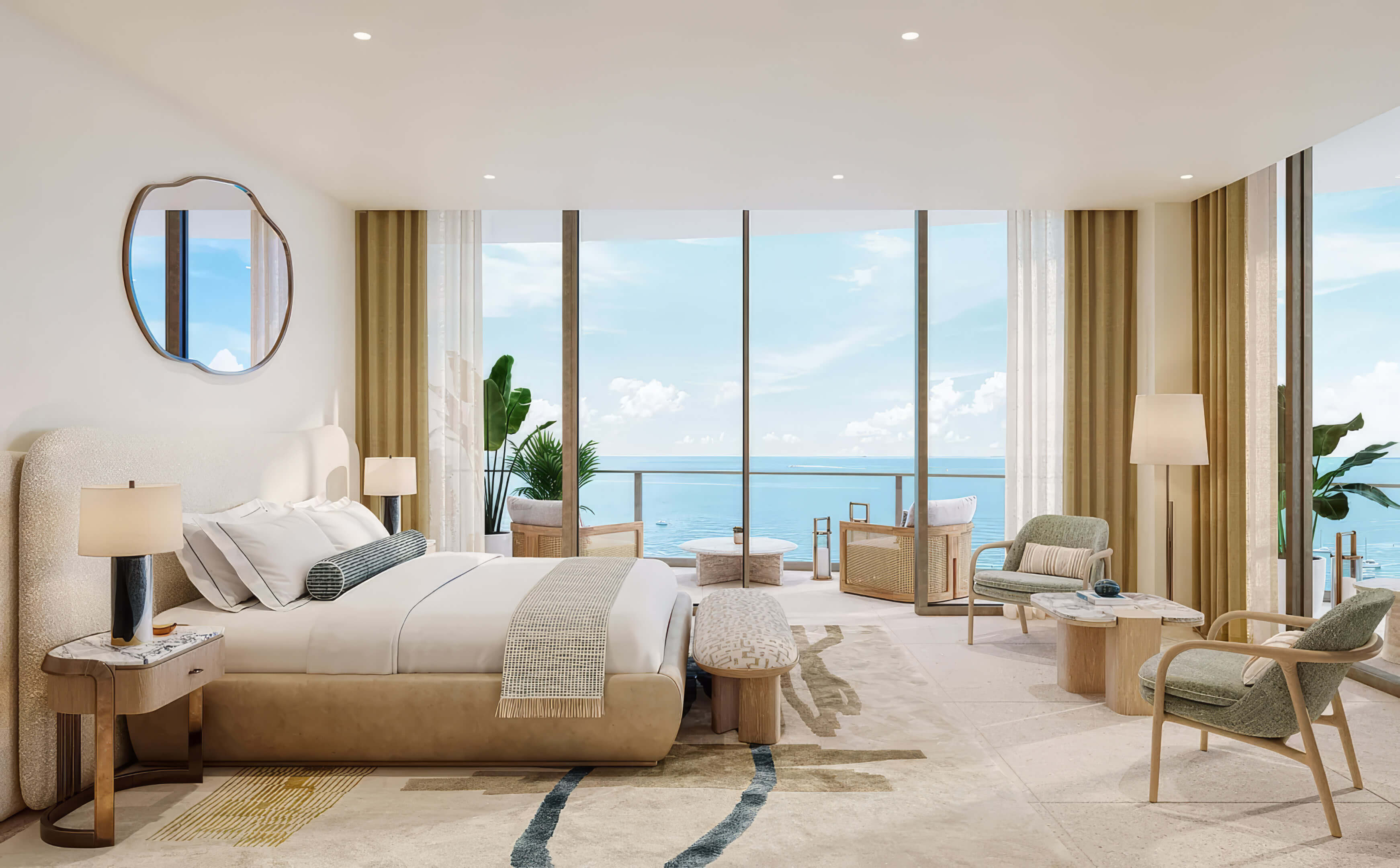 Primary bedroom with ocean views, a seating area and balcony access at St Regis Residences Bahia Mar