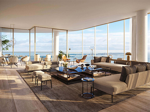 Luxury living room at The Residences at 1428 Brickell with floor-to-ceiling windows and water views