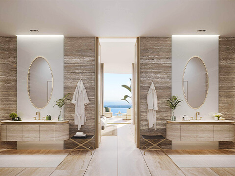 The Residences at 1428 Brickell Miami primary bathroom with double vanity and refined stone finishes