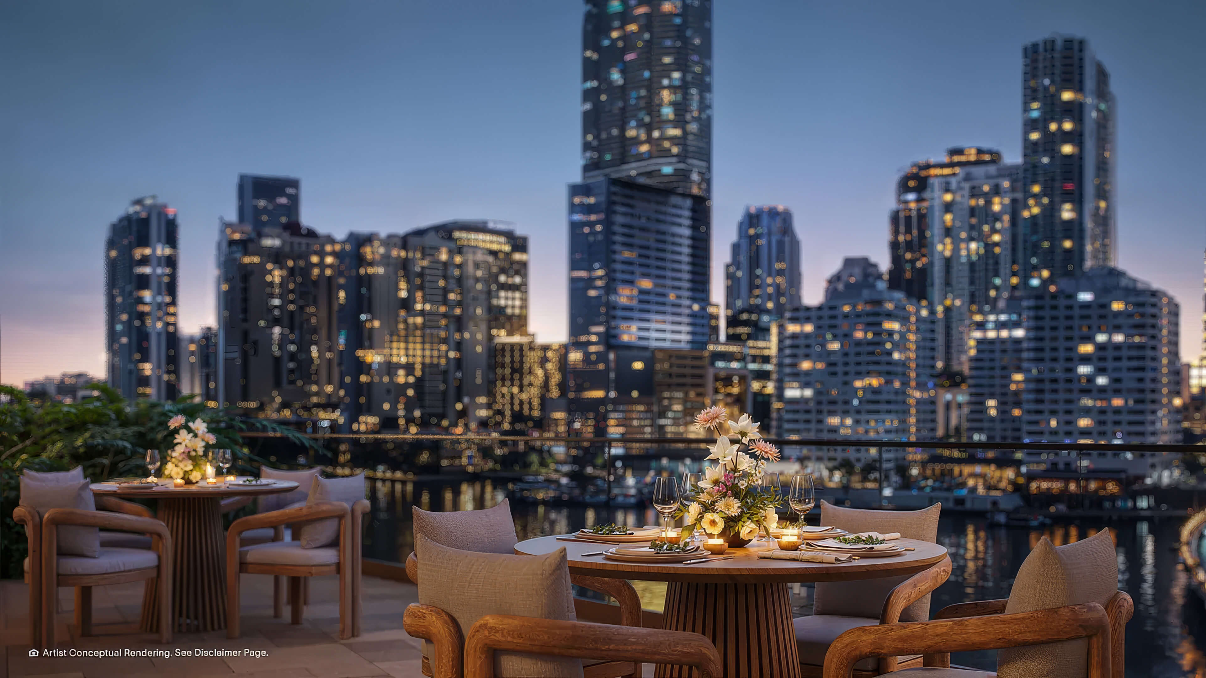 Waterfront dining terrace at The Residences Mandarin Oriental Miami with illuminated skyline views