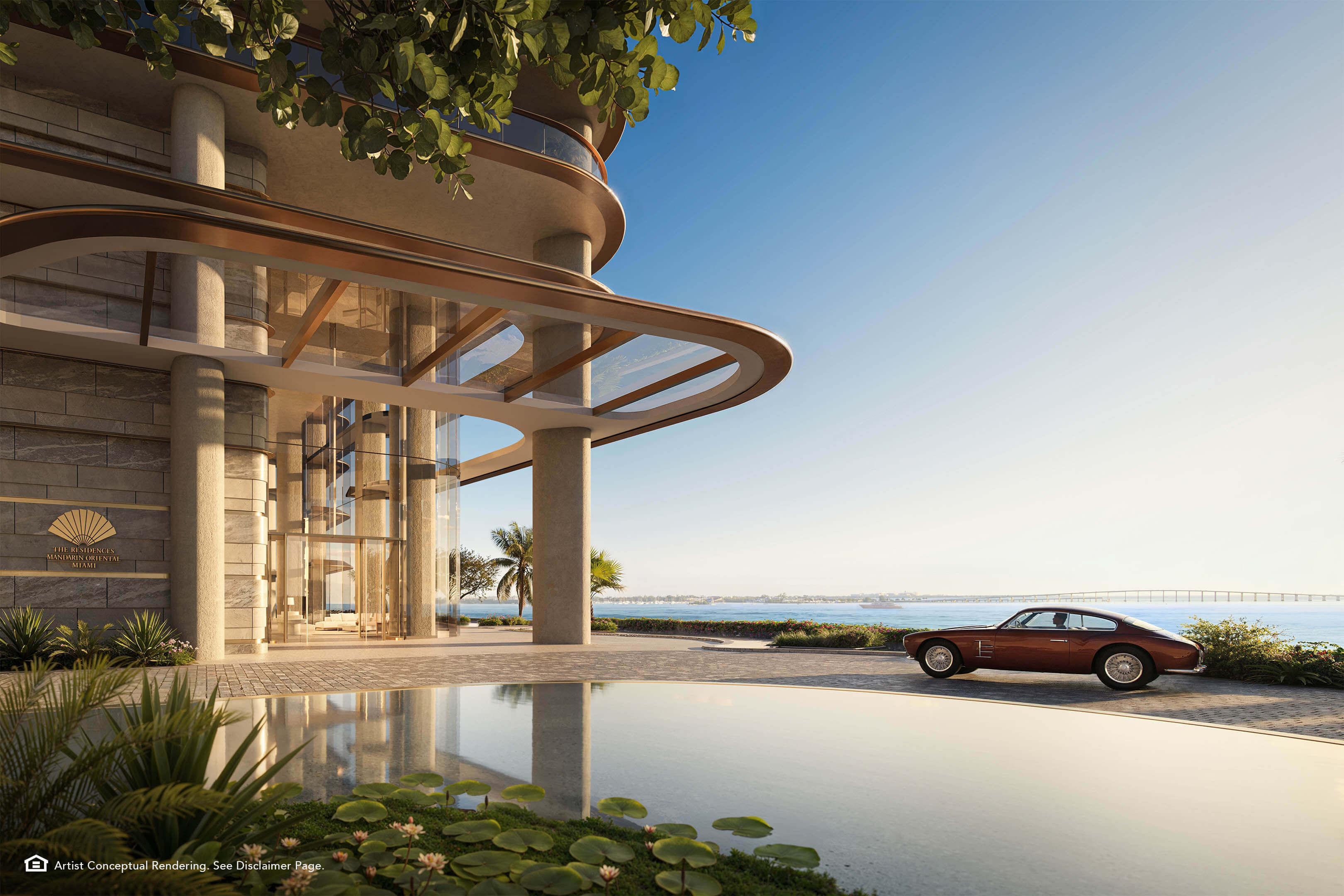 Elegant waterfront arrival at The Residences Mandarin Oriental with modern architecture and bay views