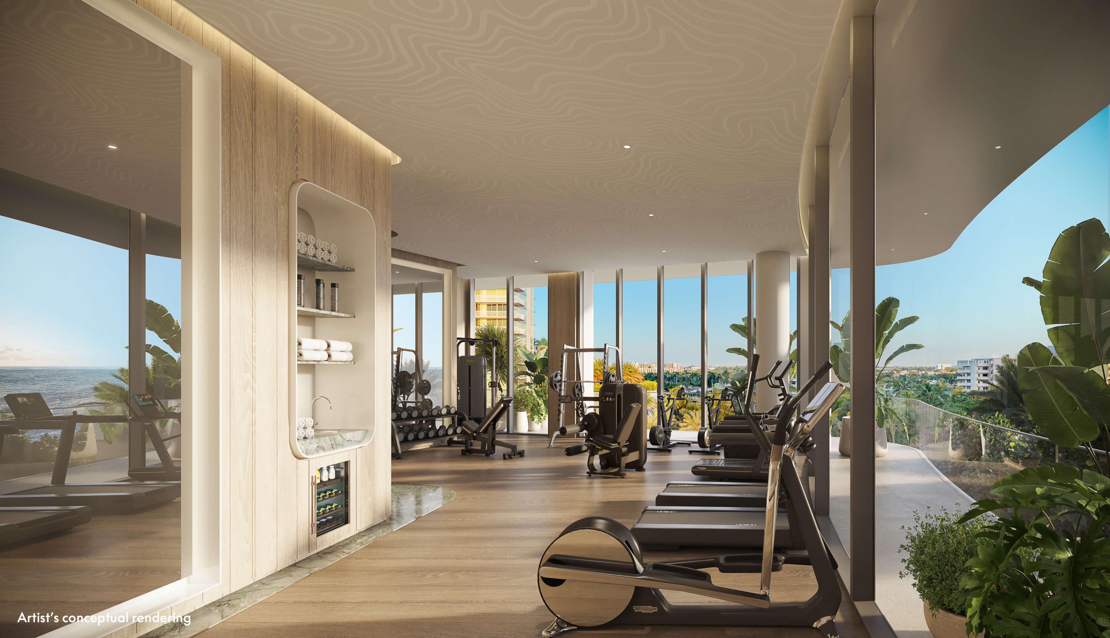 Daylight fitness center at W Pompano Beach with cardio machines and lush outdoor views