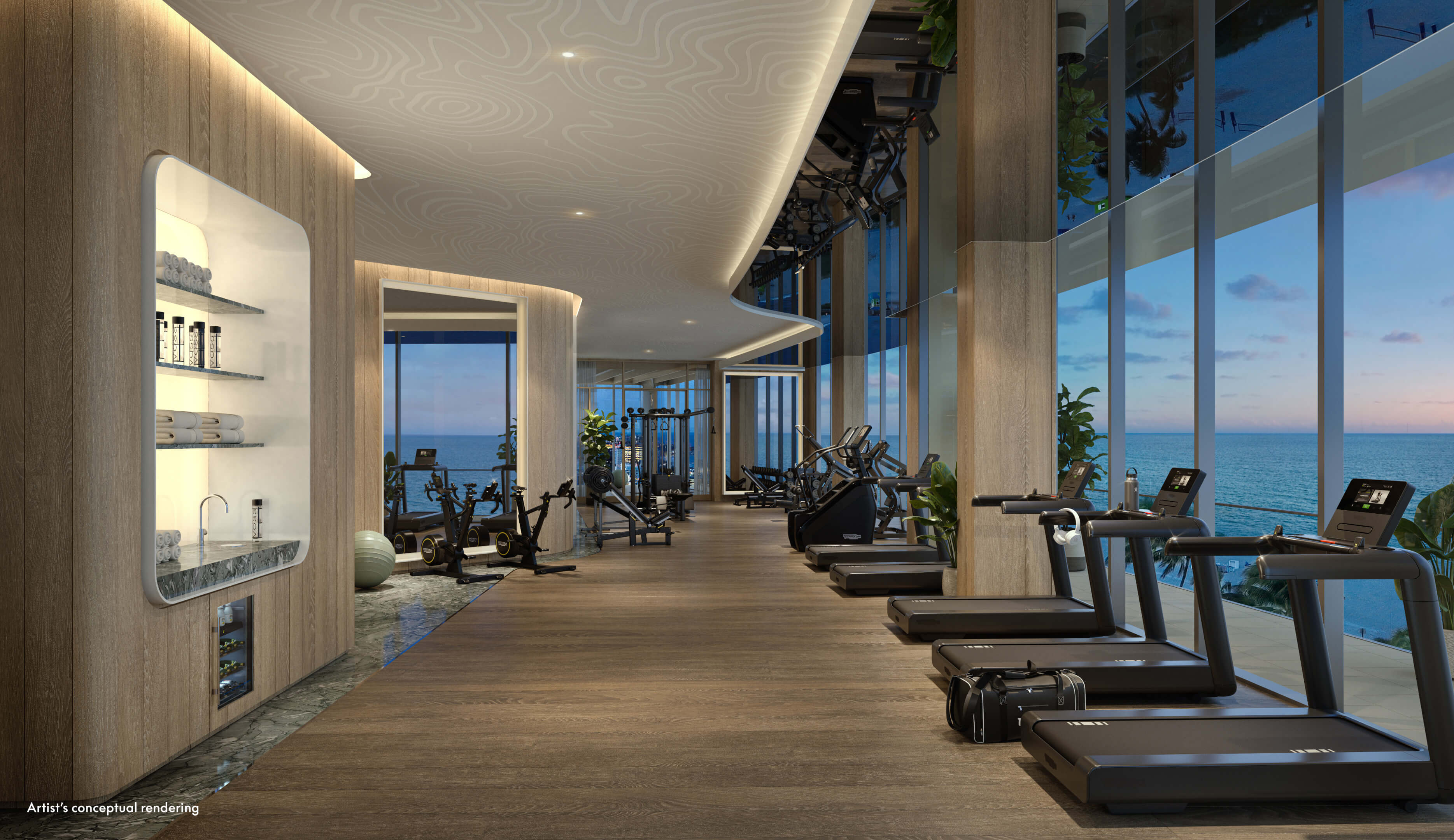 Oceanfront gym at W Pompano Beach with modern equipment and panoramic sea view