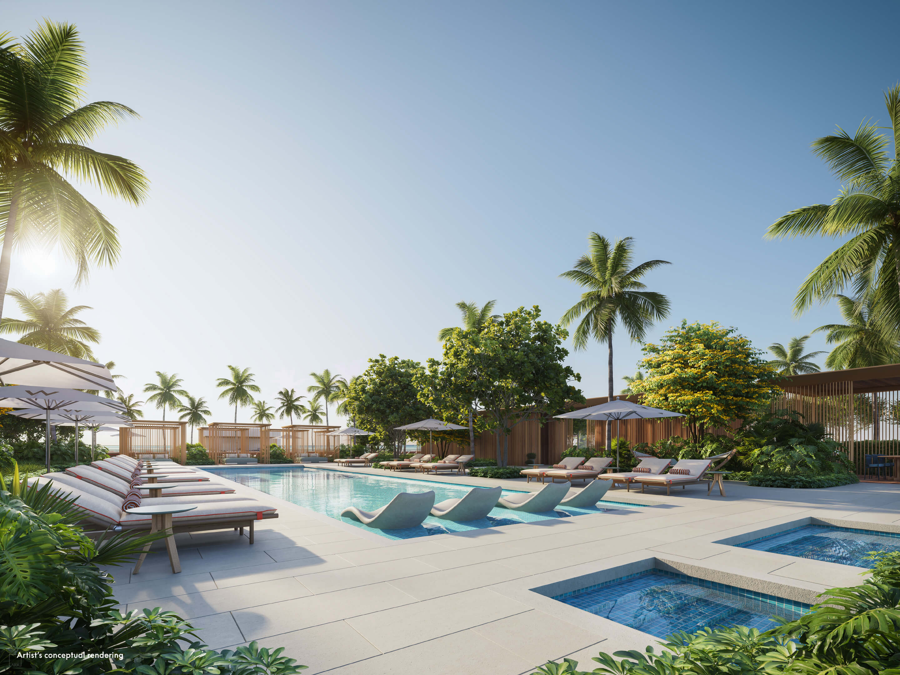 Resort-style pool deck at W Pompano Beach surrounded by palm trees and sun loungers