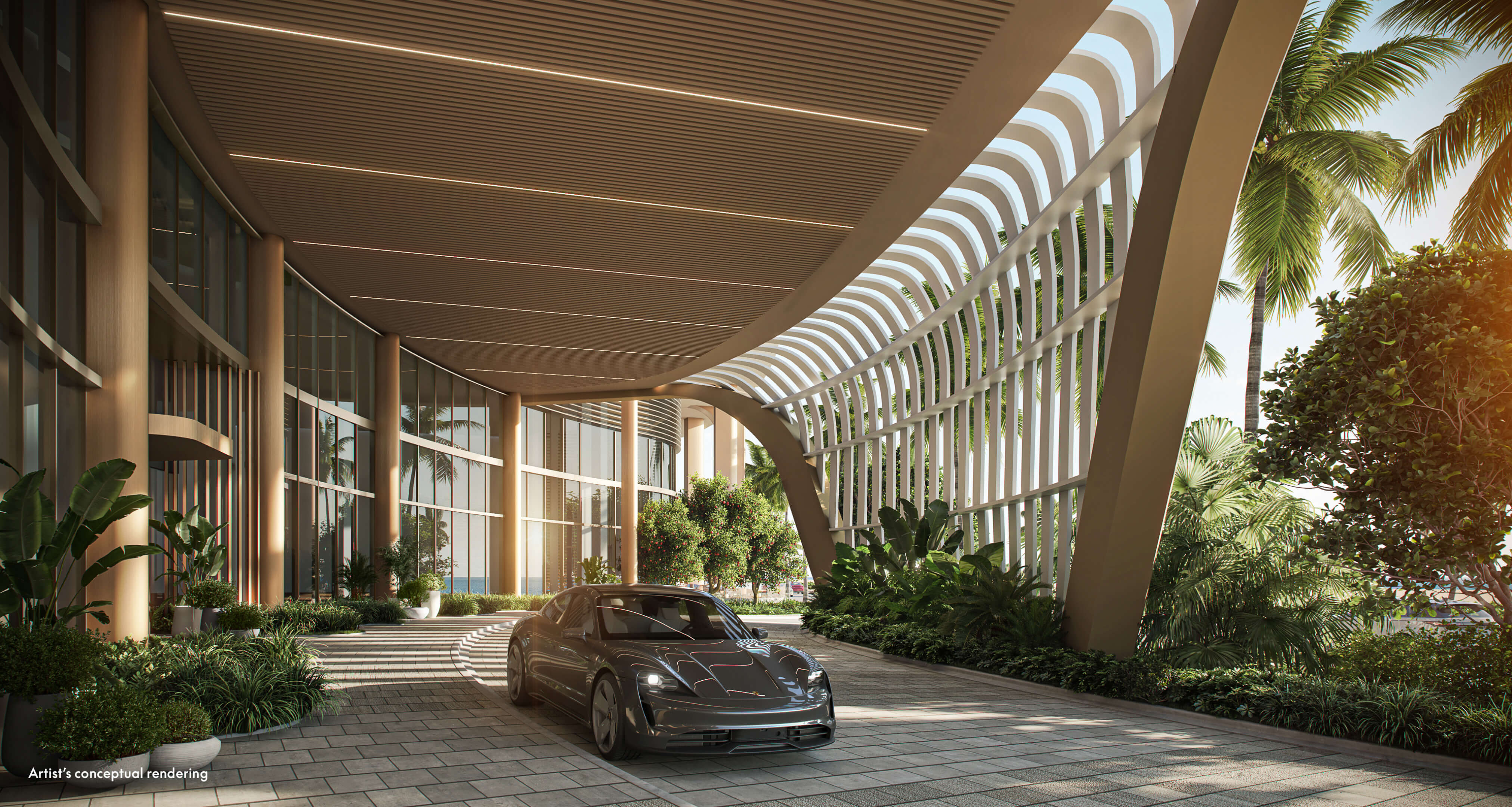 Driveway entrance of W Pompano Beach featuring luxury vehicle and architectural canopy