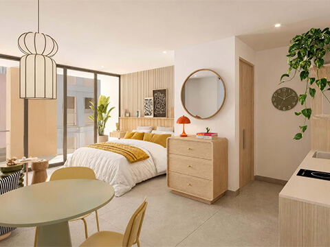Modern studio residence at WOMA Wynwood in Miami with integrated kitchen, dining area and bedroom