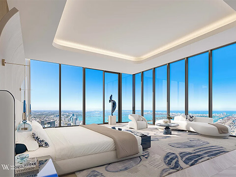 Waldorf Astoria luxury bedroom suite with panoramic Miami skyline and ocean views