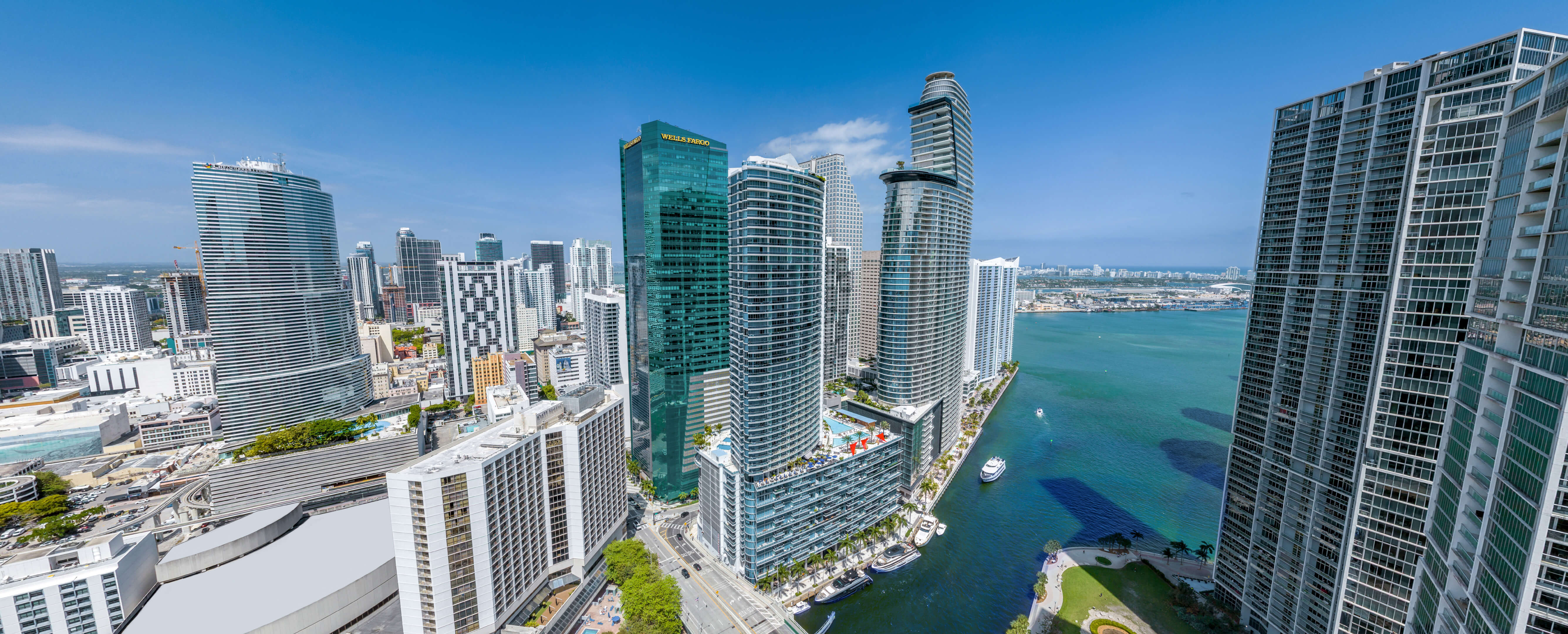 Bayfront skyscrapers view including Viceroy Brickell in Downtown Miami with turquoise water and skyline