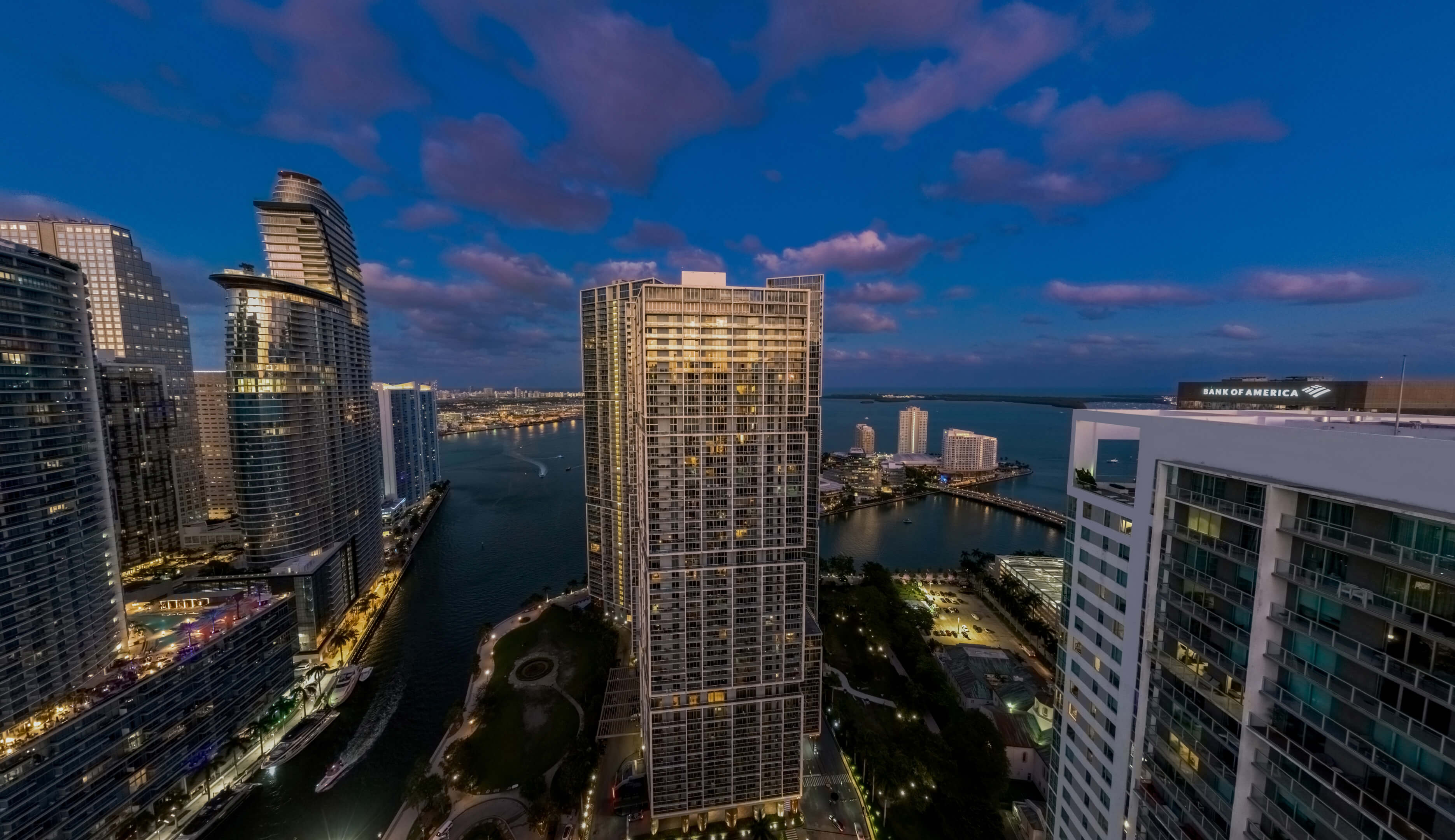 Evening waterfront perspective of Viceroy Brickell and Miami high-rises by the bay