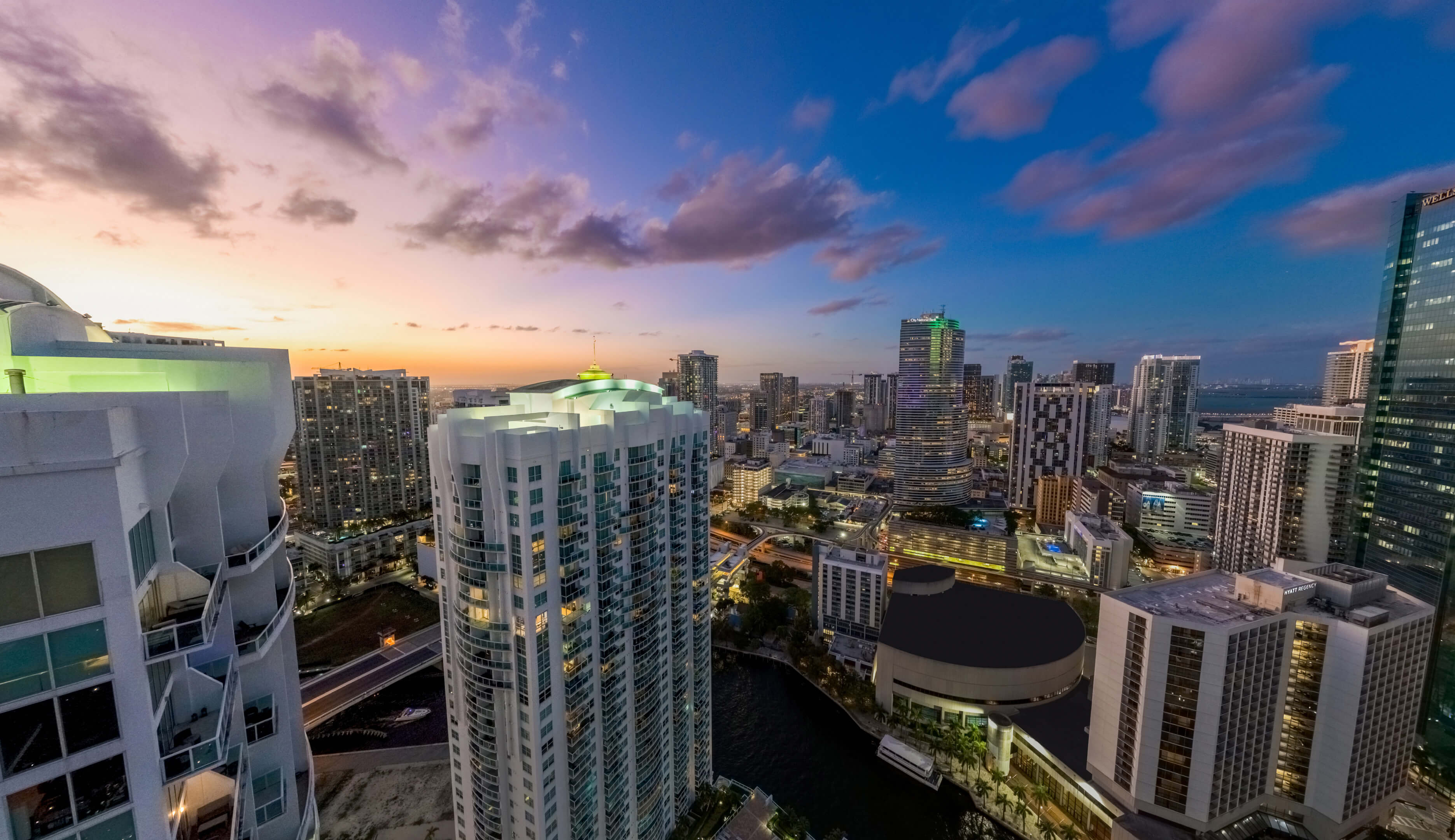 Panoramic sunset skyline view with Viceroy Brickell and surrounding Miami towers