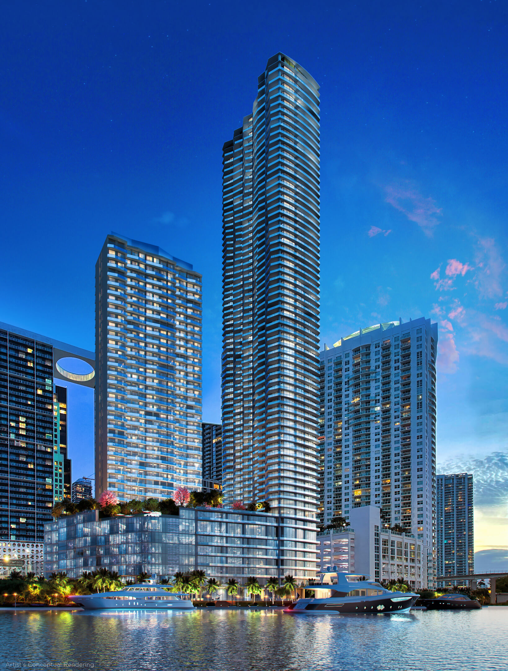 Nighttime rendering of Viceroy Brickell tower rising along the bayfront with yacht access